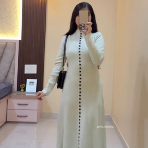 Ivory Echo: Buttoned Grace in Monochrome Harmony